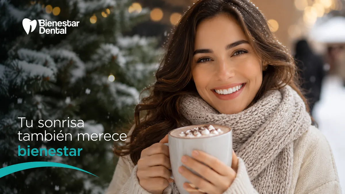 Persona con sonrisa saludable en invierno, protegiendo sus dientes del frío